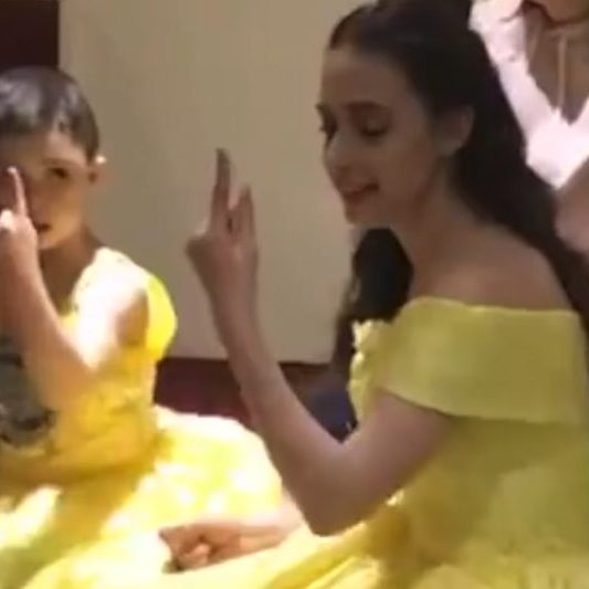 Profoundly deaf boy mesmerised by signing princess