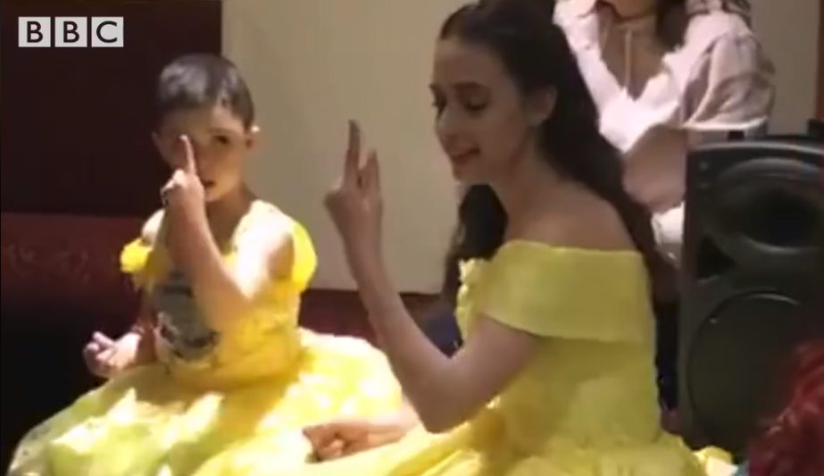 Profoundly deaf boy mesmerised by signing princess