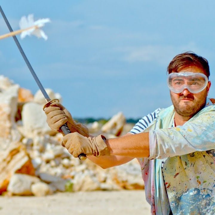 slow motion slicing an arrow